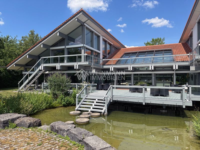 Exklusives Anwesen auf Parkgrundstück – HUF-Architektur trifft auf Natur und Wohnkultur